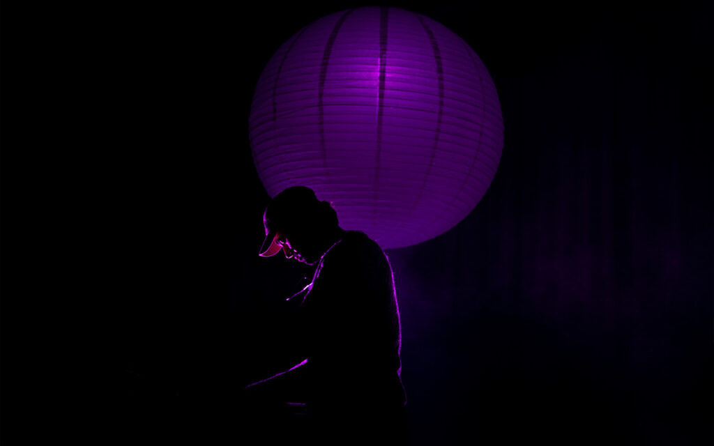 Konzertfotografie von Musiker Xavi auf der Bühne in NRW